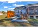 Spacious backyard featuring a hot tub, stairs to porch, and a privacy fence at 3217 Satterwhite Point Rd, Henderson, NC 27537