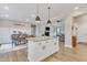 Open concept kitchen with granite countertops and dining area at 3217 Satterwhite Point Rd, Henderson, NC 27537