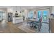 Well-lit kitchen and dining area with a seamless flow, great for entertaining and everyday living at 3217 Satterwhite Point Rd, Henderson, NC 27537