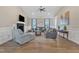Inviting living room featuring a fireplace, neutral tones, and ample natural light, perfect for relaxation and entertaining at 3217 Satterwhite Point Rd, Henderson, NC 27537