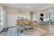 Open-concept layout connecting dining and living areas, creating a spacious and welcoming atmosphere at 3217 Satterwhite Point Rd, Henderson, NC 27537