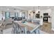 Bright open-concept kitchen, dining, and living area, perfect for modern living and entertaining guests at 3217 Satterwhite Point Rd, Henderson, NC 27537