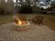 Cozy firepit area perfect for outdoor gatherings at 8604 Lobelia St, Raleigh, NC 27603