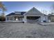 Newly constructed one-story home with a two-car garage and covered porch at 102 Roma Gora Ct, Princeton, NC 27569