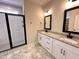 Stylish bathroom with dual sinks, granite countertops, walk-in shower, and elegant tile flooring at 103 Roma Gora Ct, Princeton, NC 27569
