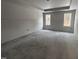 Unfinished bedroom with two windows and ample space at 103 Roma Gora Ct, Princeton, NC 27569