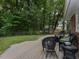 Back deck with patio furniture and a view of the backyard at 178 Paceville Rd, Selma, NC 27576