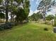 Spacious backyard with a well-maintained lawn and secure black chainlink fence at 178 Paceville Rd, Selma, NC 27576