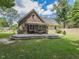Inviting outdoor living space featuring a tiered deck with comfortable seating at 178 Paceville Rd, Selma, NC 27576