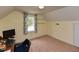 Bedroom with carpet and a window bringing in natural light at 178 Paceville Rd, Selma, NC 27576