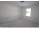 Spacious bedroom with large window and neutral color palette at 7130 Hubner Pl # 34, Cary, NC 27519