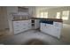 New kitchen with white shaker cabinets and quartz countertops at 7130 Hubner Pl # 34, Cary, NC 27519