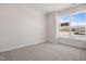 Bright bedroom with large window and neutral decor at 1221 Cricket St, Elon, NC 27244