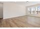 Spacious bonus room with hardwood floors and large windows at 1221 Cricket St, Elon, NC 27244