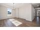 Bright dining room features hardwood floors and wainscoting at 1221 Cricket St, Elon, NC 27244