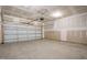 Unfinished garage with an automatic garage door opener at 1221 Cricket St, Elon, NC 27244
