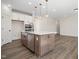 Kitchen island with stainless steel dishwasher and sink at 1221 Cricket St, Elon, NC 27244