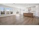 Open concept kitchen with island and access to backyard at 1221 Cricket St, Elon, NC 27244