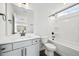 Bathroom featuring a modern vanity, toilet and a shower with tub at 1233 Cricket St, Elon, NC 27244