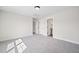 Sun-filled carpeted bedroom with ensuite bathroom access and great natural light at 1233 Cricket St, Elon, NC 27244