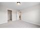 Neutral bedroom featuring carpet, ample space and a door to the bathroom at 1233 Cricket St, Elon, NC 27244
