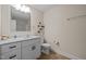 Bathroom with vanity, toilet and shower/tub combo at 138 Ottawa Dr, Louisburg, NC 27549