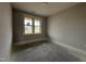 Cozy bedroom with lots of natural light from a window and neutral walls, perfect for relaxation and comfort at 141 Ruskin Dr, Smithfield, NC 27577