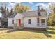 Charming one-story home with red door and small front porch at 619 N Mebane St, Burlington, NC 27217