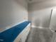 Bathroom with white vanity and blue countertop at 700 Tuscany Cir, Princeton, NC 27569