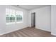 Bedroom with carpet floors and a large window at 11320 International Dr, Middlesex, NC 27557