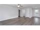 Living room with hardwood floors and white doors at 11320 International Dr, Middlesex, NC 27557