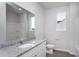 Bathroom with granite countertops and a large mirror at 11340 International Dr, Middlesex, NC 27557