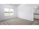 Bright bedroom with a large window at 11340 International Dr, Middlesex, NC 27557