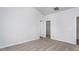Neutral bedroom with a view into closet space at 11340 International Dr, Middlesex, NC 27557