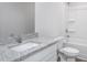 Bathroom featuring granite countertop, white vanity, and bathtub with shower at 11360 International Dr, Middlesex, NC 27557