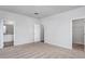 Bright bedroom featuring neutral walls, carpet, and closet at 11360 International Dr, Middlesex, NC 27557