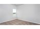 Carpeted bedroom featuring neutral walls and one window at 11376 International Dr, Middlesex, NC 27557