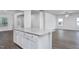 Spacious living room with wood-look floors and neutral paint throughout at 11376 International Dr, Middlesex, NC 27557