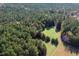 Dense forest with a small clearing at 206 Pike Memory Ln, Staley, NC 27355