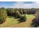 Beautiful expansive land with mature trees and scenic views, ideal for building or recreation at 206 Pike Memory Ln, Staley, NC 27355