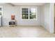 Bright living room with a large window, gas heater, and neutral tones at 206 Pike Memory Ln, Staley, NC 27355