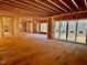 Large great room with sliding glass doors and a view of the backyard at 2408 Toll Mill Ct, Raleigh, NC 27606
