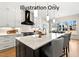 Modern kitchen with island, white cabinets, and stainless steel appliances at 2408 Toll Mill Ct, Raleigh, NC 27606
