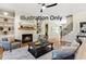 Spacious living room with fireplace and built-in shelving at 2408 Toll Mill Ct, Raleigh, NC 27606