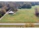 View of farmland with barns and pastures at 1002 Kenion Rd, Hillsborough, NC 27278