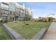 Well-manicured lawn outside a modern apartment building at 1239 Shaw View Alley # 201, Raleigh, NC 27601