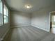 Spacious bedroom with plush carpeting and natural light at 409 Marthas View Way, Wake Forest, NC 27587