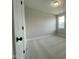 A light and airy carpeted bedroom featuring a single window and neutral wall color at 409 Marthas View Way, Wake Forest, NC 27587