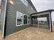 A lovely exterior of a home, showcasing a screened in porch and neutral-colored siding at 409 Marthas View Way, Wake Forest, NC 27587