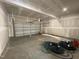 Spacious two car garage providing ample parking and storage space at 409 Marthas View Way, Wake Forest, NC 27587